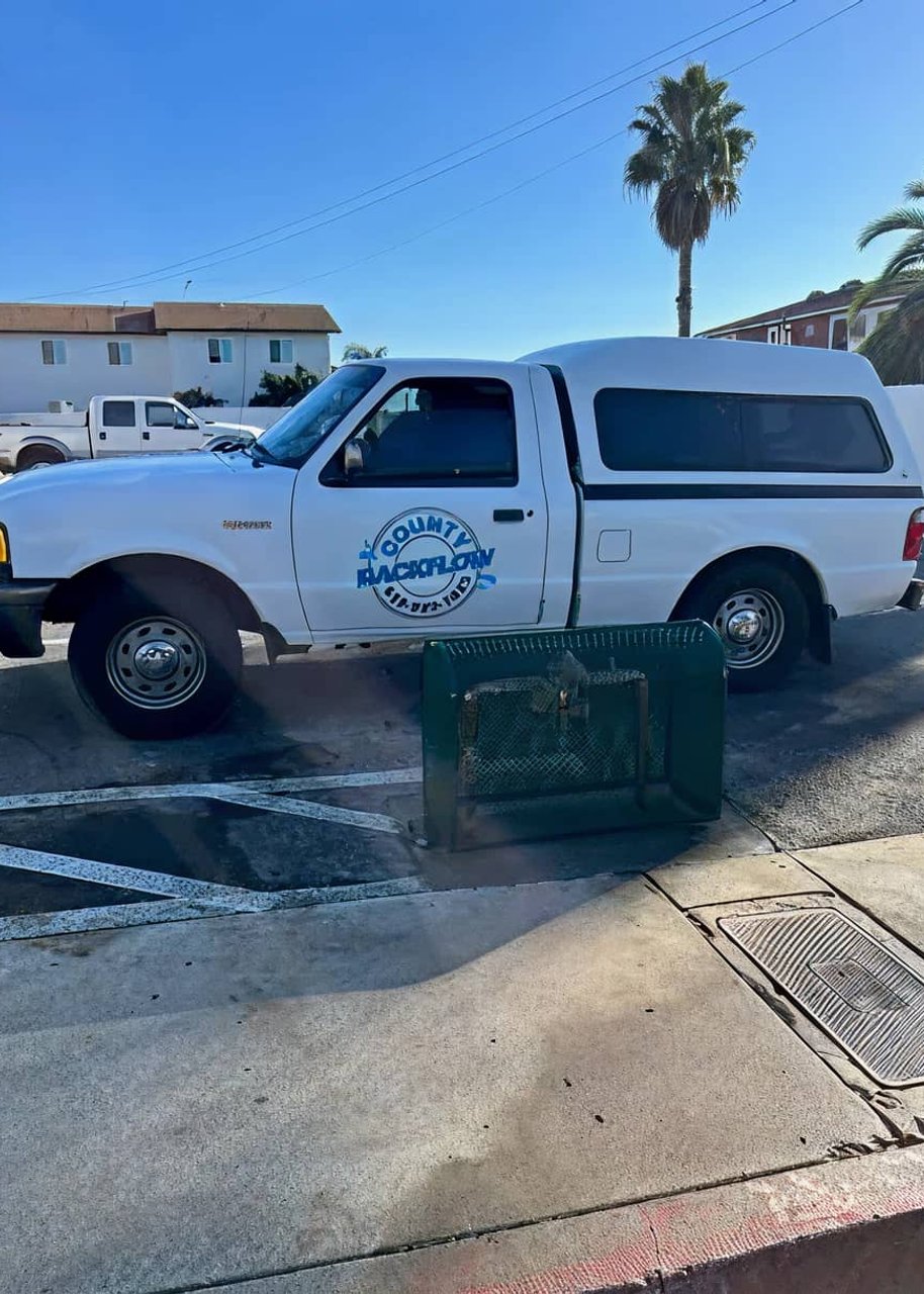 County Backflow service truck parked on site